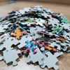 Um 1000 Teile individueller Papierpuzzles aus der Fabrik zuzuordnen